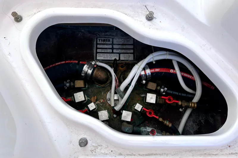  Yacht Photos Pics 2008 Tiara Yachts 3500 Sovran engine compartment with hoses and fittings.