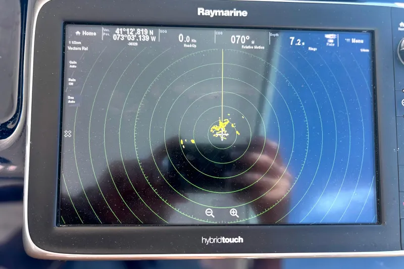  Yacht Photos Pics Raymarine navigation display on 2008 Tiara Yachts 3500 Sovran, showing radar and coordinates.