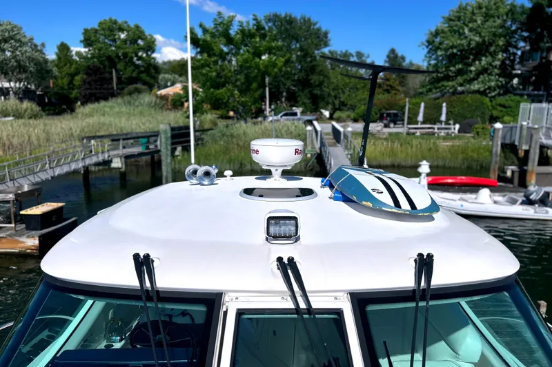  Yacht Photos Pics 2008 Tiara Yachts 3500 Sovran docked, showcasing radar and equipment on deck.