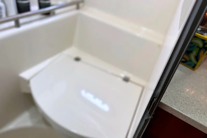  Yacht Photos Pics 2008 Tiara Yachts 3500 Sovran bathroom with modern fixtures and countertop.