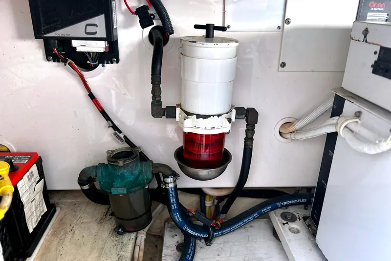  Yacht Photos Pics Engine compartment of a 2008 Tiara Yachts 3500 Sovran, featuring various mechanical components.