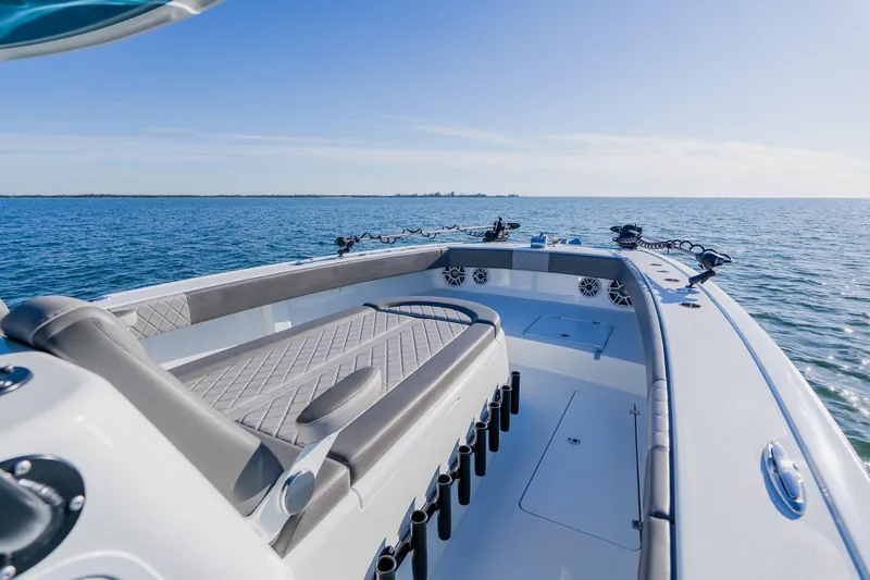 Reel Blessed Yacht Photos Pics 2025 Freeman 42LR boat on open water, showcasing sleek design and spacious deck.