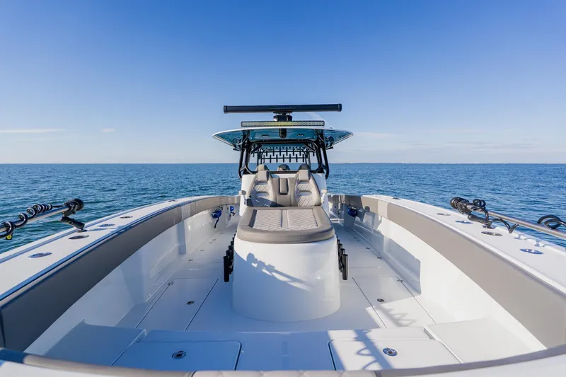 Reel Blessed Yacht Photos Pics Freeman 42LR 2025 boat on open sea, showcasing sleek design and spacious deck.