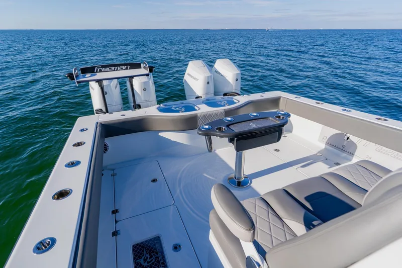 Reel Blessed Yacht Photos Pics 2025 Freeman 42LR boat with dual Mercury engines on open sea.