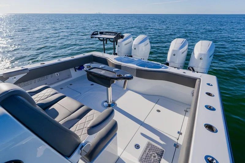 Reel Blessed Yacht Photos Pics Luxury Freeman 42LR boat, 2025 model, with sleek seating and powerful engines on open water.