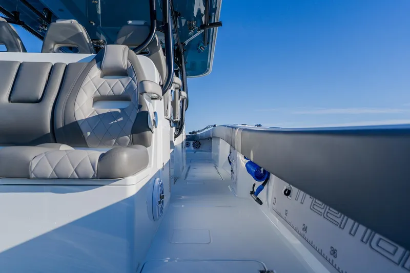 Reel Blessed Yacht Photos Pics Luxurious interior of 2025 Freeman 42LR boat with plush seating and sleek design.