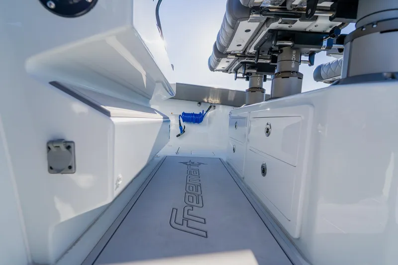 Reel Blessed Yacht Photos Pics 2025 Freeman 42LR boat interior with sleek design and storage compartments.