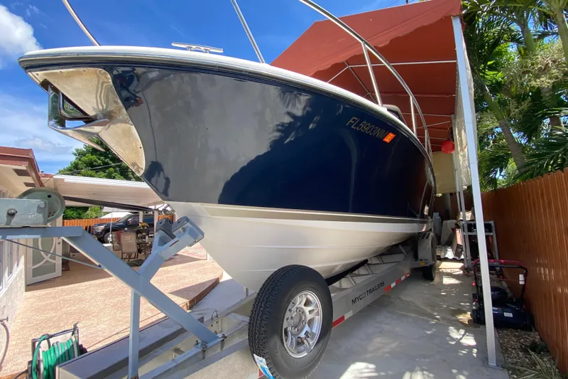  Yacht Photos Pics 2006 Pursuit 3480 Drummond Island Runner boat on trailer under canopy.