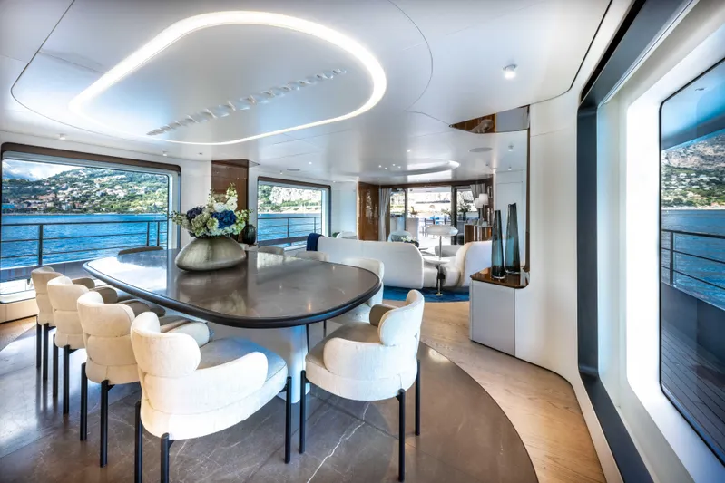 Ocean One Yacht Photos Pics Luxurious interior of 2022 Azimut Grande 36M yacht with elegant dining area and scenic ocean views.
