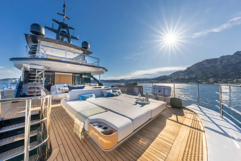 Ocean One Yacht Photos Pics Luxurious 2022 Azimut Grande 36M yacht deck with sun loungers and ocean view.