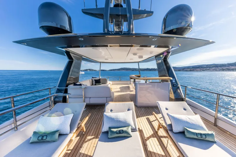 Ocean One Yacht Photos Pics Luxurious 2022 Azimut Grande 36M yacht deck with sun loungers and ocean view.