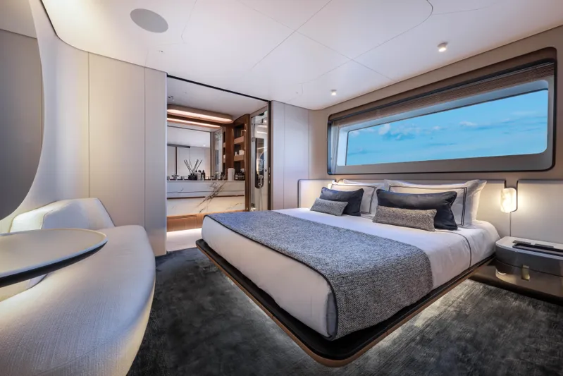 Ocean One Yacht Photos Pics Luxurious bedroom interior of 2022 Azimut Grande 36M yacht with modern design and large window view.