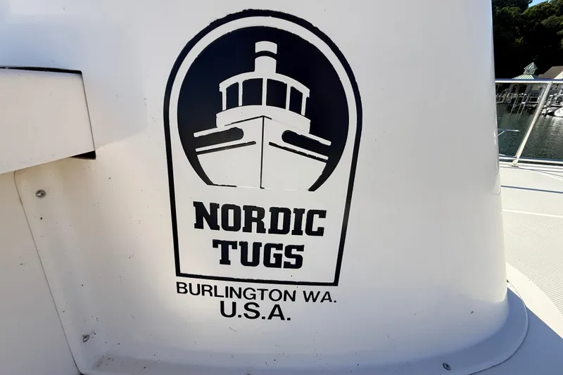 Nomad Yacht Photos Pics Nordic Tug 37 logo on boat, Burlington WA, USA, year 2000.