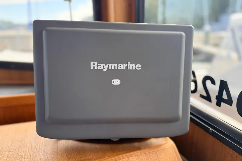 Nomad Yacht Photos Pics Raymarine E120 display on 2000 Nordic Tug 37 boat interior.