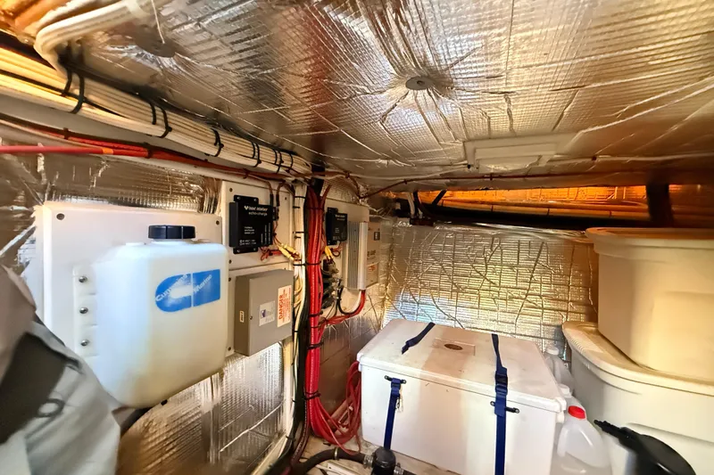Nomad Yacht Photos Pics Engine room of a 2000 Nordic Tug 37 with insulation and equipment.