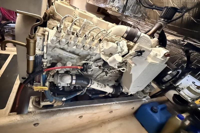 Nomad Yacht Photos Pics Engine of a 2000 Nordic Tug 37 boat, showcasing detailed mechanical components.