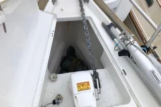 Peregrine Yacht Photos Pics Anchor locker of 2005 Beneteau 423 sailboat with chain and winch.