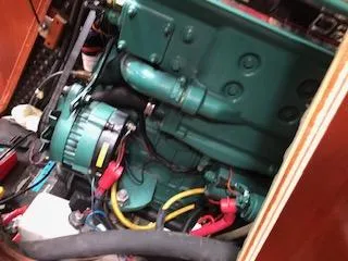 Peregrine Yacht Photos Pics Engine compartment of a 2005 Beneteau 423 sailboat, featuring wiring and components.