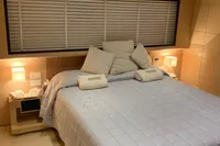 Luxurious bedroom interior on 2011 Custom C.boat 27 SC yacht.