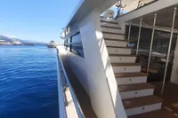 Luxury yacht C.boat 27 SC, 2011 model, docked with elegant exterior staircase.