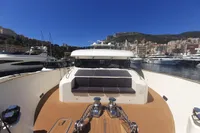 Luxurious 2011 Custom C.boat 27 SC yacht docked in scenic marina.
