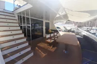Luxurious 2011 Custom C.boat 27 SC yacht deck with seating and stairs.