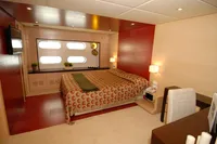 Luxurious bedroom interior on 2011 Custom C.boat 27 SC yacht, featuring modern design.