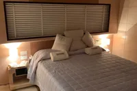 Luxurious bedroom interior on 2011 Custom C.boat 27 SC yacht.