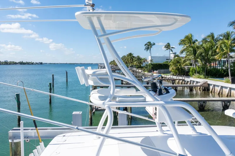  Yacht Photos Pics 2015 Intrepid 400 Center Console boat with scenic waterfront view.