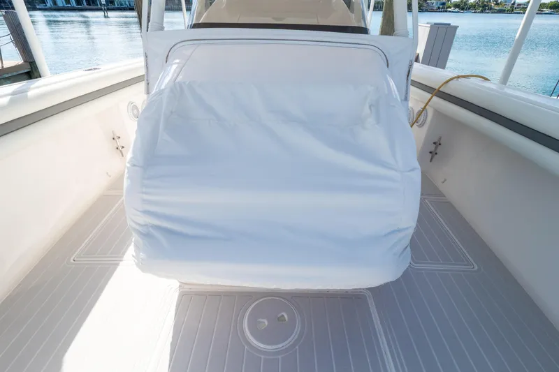  Yacht Photos Pics 2015 Intrepid 400 Center Console boat interior with covered seating area.