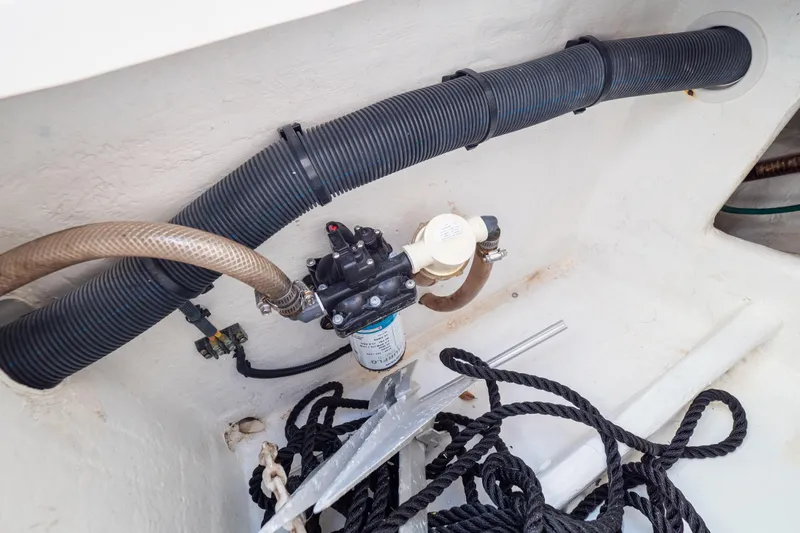  Yacht Photos Pics 2015 Intrepid 400 Center Console boat interior with hoses, pump, and ropes.