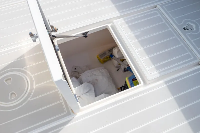  Yacht Photos Pics Open storage compartment on 2015 Intrepid 400 Center Console boat deck.