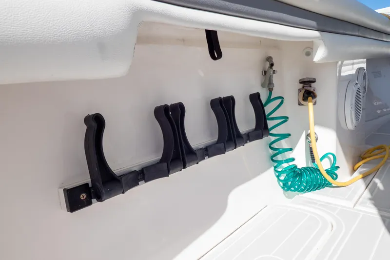 Yacht Photos Pics 2015 Intrepid 400 Center Console boat interior with hose and rod holders.