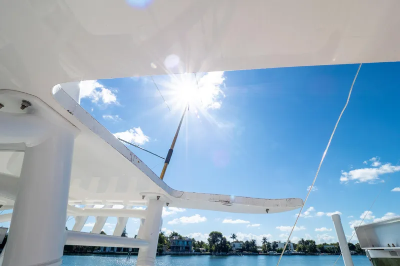  Yacht Photos Pics 2015 Intrepid 400 Center Console boat under bright sun and clear blue sky.
