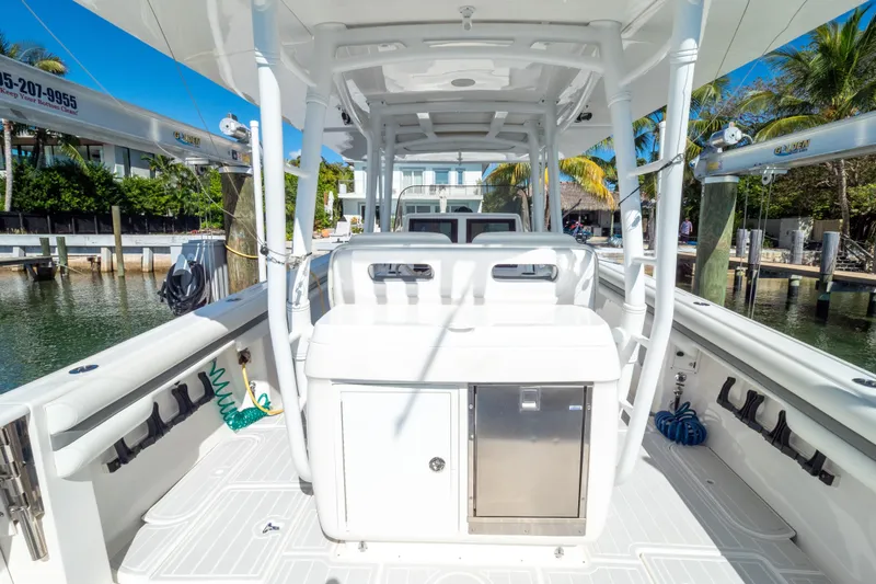  Yacht Photos Pics 2015 Intrepid 400 Center Console boat docked, featuring spacious deck and modern amenities.