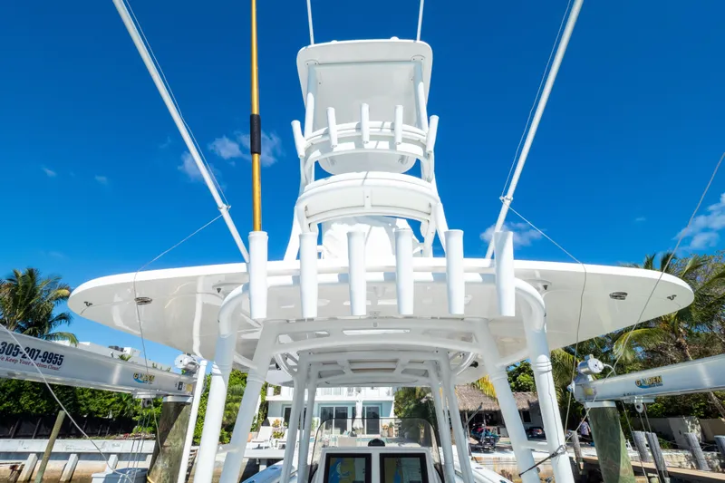  Yacht Photos Pics 2015 Intrepid 400 Center Console boat with tower against clear blue sky.