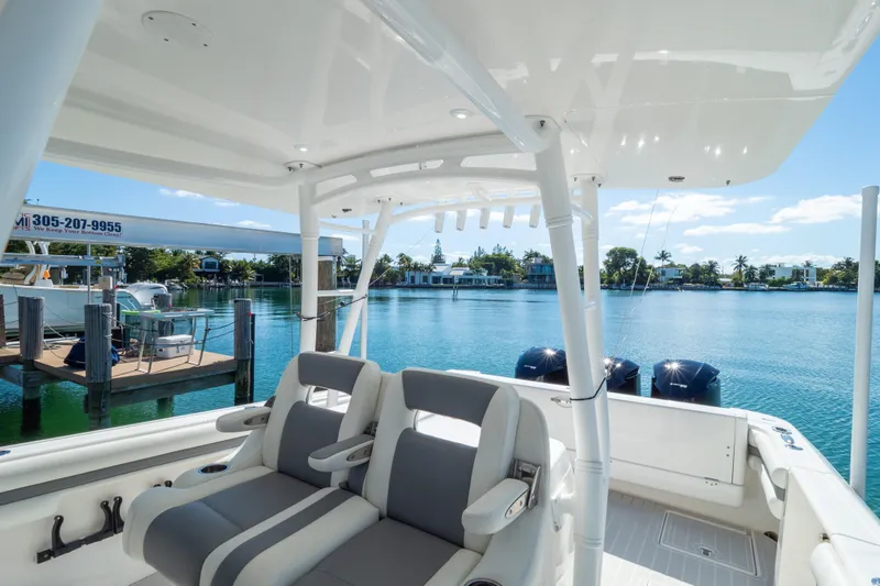  Yacht Photos Pics 2015 Intrepid 400 Center Console boat interior with waterfront view.