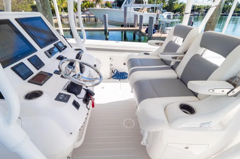  Yacht Photos Pics 2015 Intrepid 400 Center Console boat cockpit with modern controls and seating.