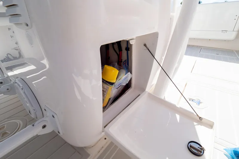  Yacht Photos Pics Open storage compartment on 2015 Intrepid 400 Center Console boat.