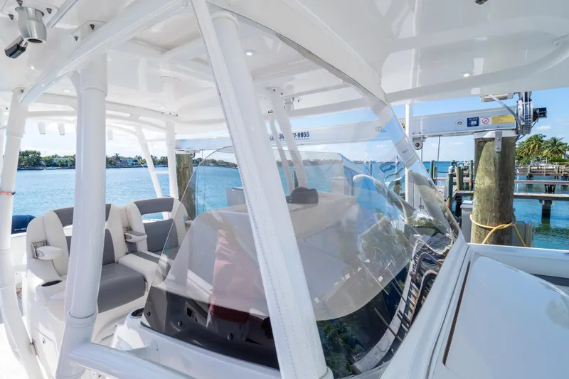  Yacht Photos Pics 2015 Intrepid 400 Center Console boat docked by the water.