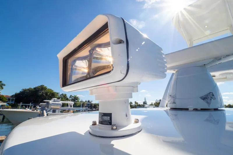  Yacht Photos Pics Close-up of a spotlight on a 2015 Intrepid 400 Center Console boat under sunny skies.