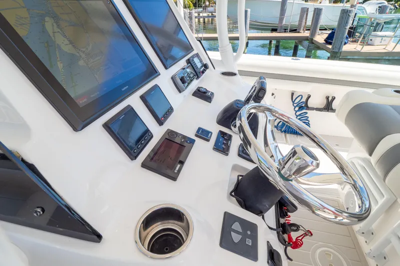  Yacht Photos Pics 2015 Intrepid 400 Center Console helm with advanced navigation displays and controls.
