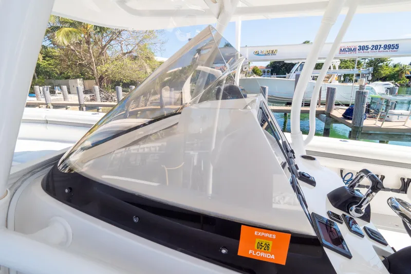 Yacht Photos Pics 2015 Intrepid 400 Center Console boat dashboard with Florida registration sticker.