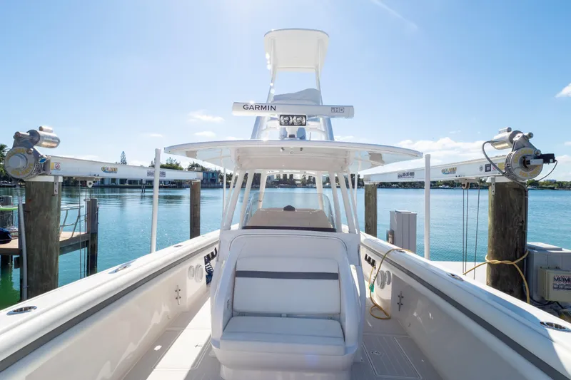  Yacht Photos Pics 2015 Intrepid 400 Center Console boat docked with clear blue water backdrop.