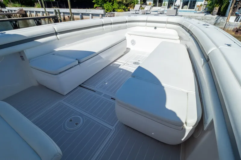  Yacht Photos Pics 2015 Intrepid 400 Center Console boat with spacious white seating area.
