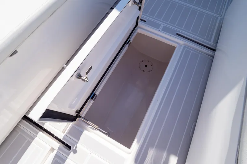  Yacht Photos Pics Open storage compartment on 2015 Intrepid 400 Center Console boat deck.