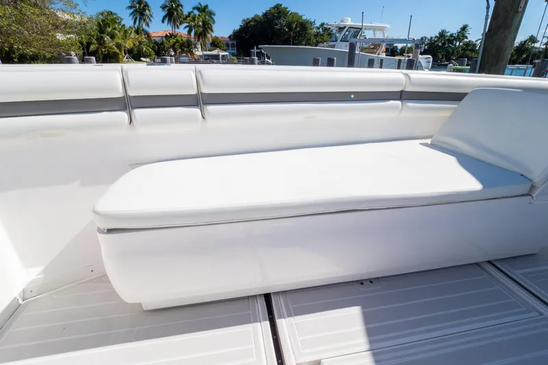  Yacht Photos Pics 2015 Intrepid 400 Center Console boat with white cushioned seating.