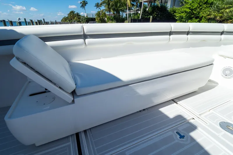  Yacht Photos Pics 2015 Intrepid 400 Center Console boat with white cushioned seating and sunny deck.