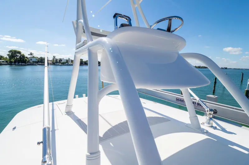  Yacht Photos Pics 2015 Intrepid 400 Center Console boat on calm water, sunny day, clear sky.