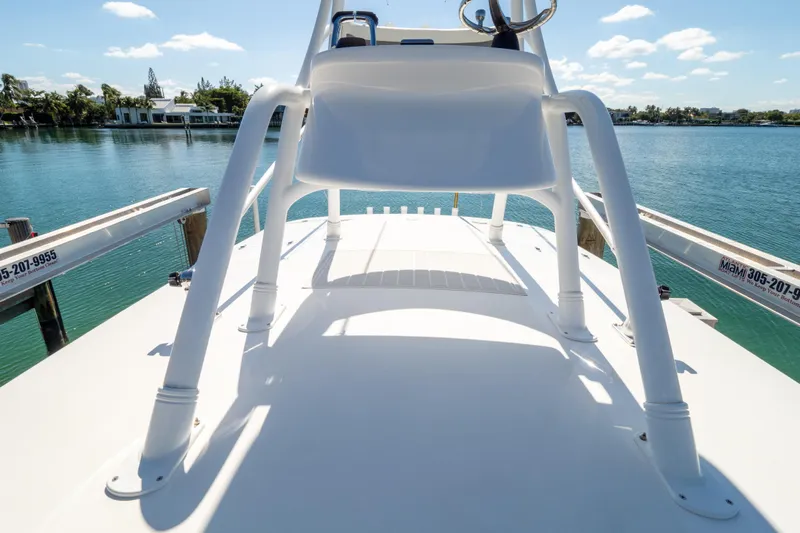  Yacht Photos Pics 2015 Intrepid 400 Center Console boat on calm water, sunny day, docked.